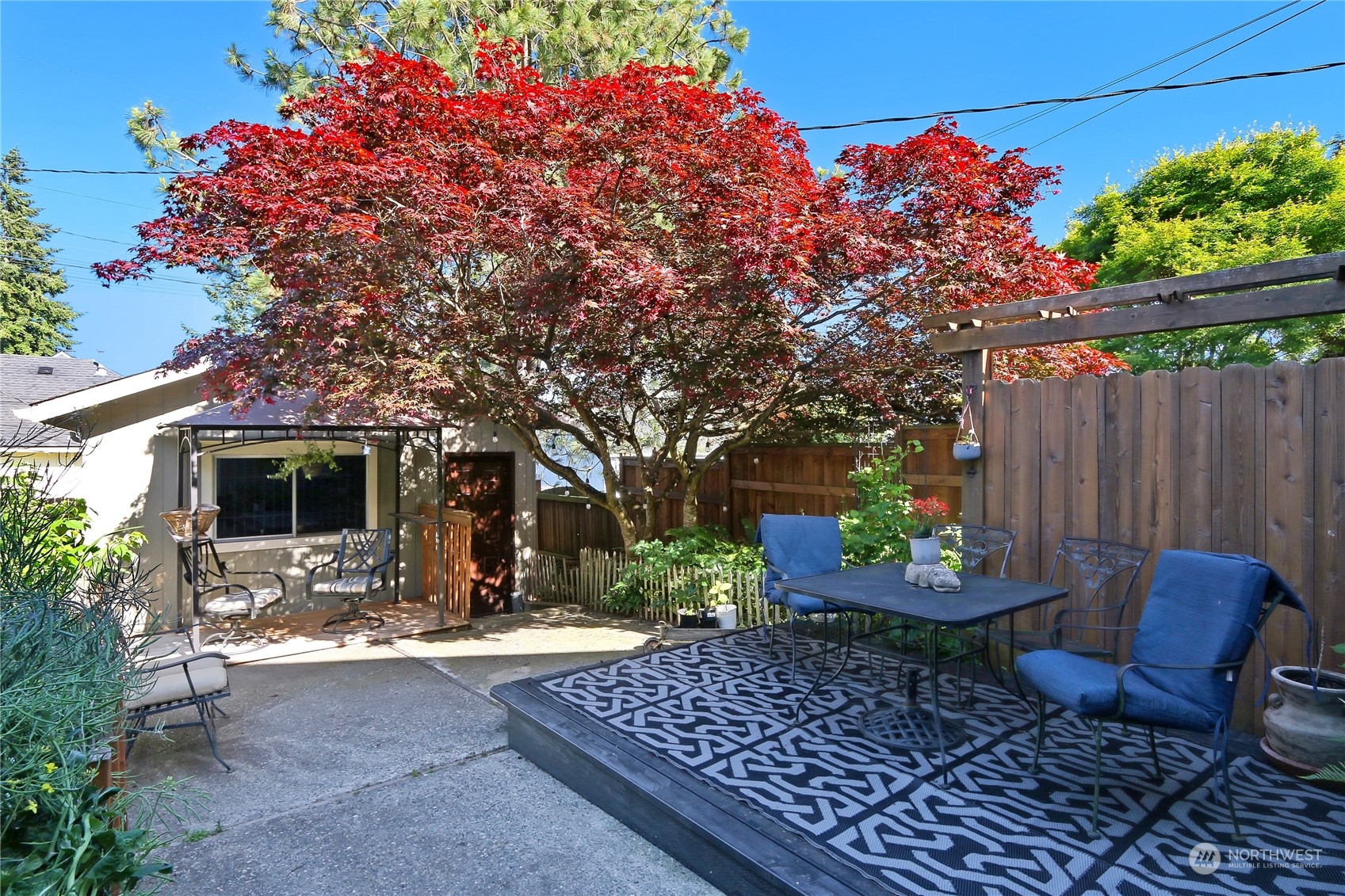 2203 Rockefeller Avenue Everett, WA 98201 - Photo 28 of 31 a view of outdoor sitting area with furniture and wooden fence