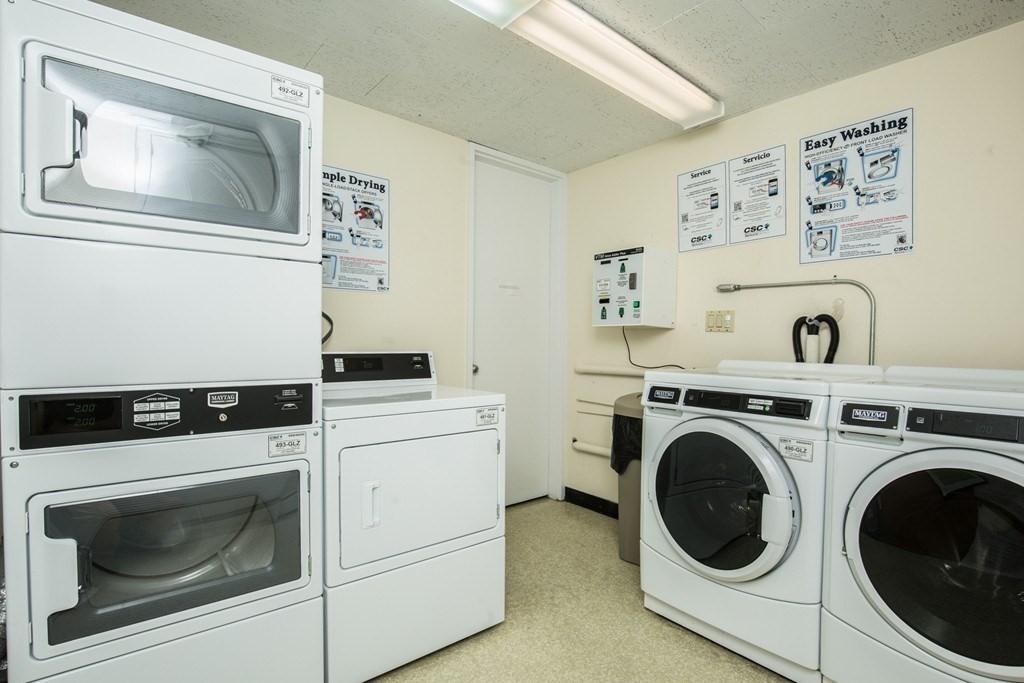 12 Inman Street, Unit 52 Cambridge, MA 02139 - Photo 8 of 12 a utility room with dryer and washer