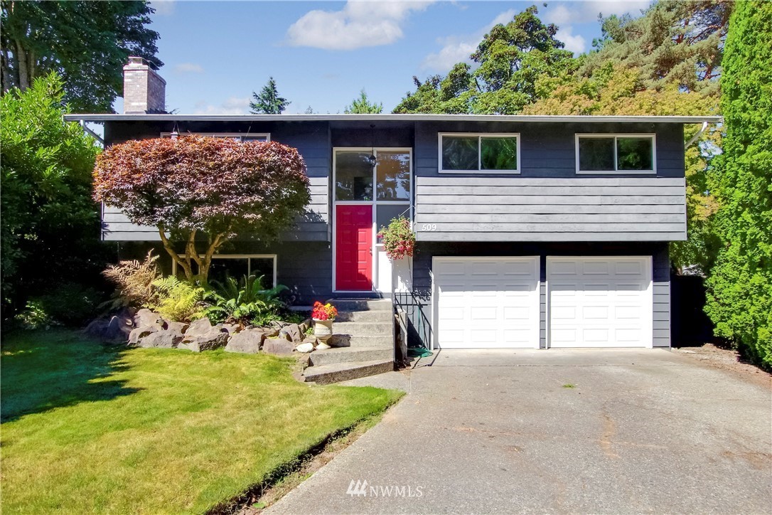 509 223rd Street Southwest Bothell, WA 98021 - Photo 1 of 39 a view of house with backyard and sitting area