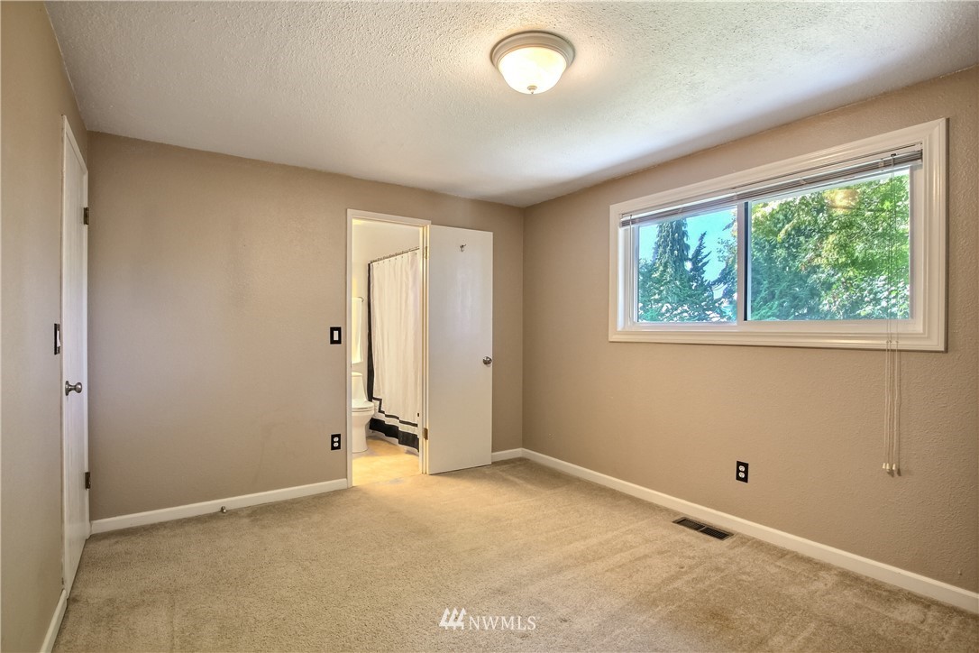 509 223rd Street Southwest Bothell, WA 98021 - Photo 14 of 39 an empty room with windows