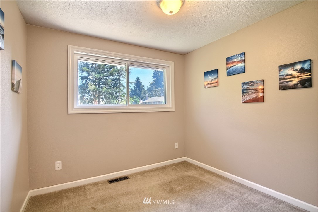 509 223rd Street Southwest Bothell, WA 98021 - Photo 20 of 39 a view of room with window and cabinet