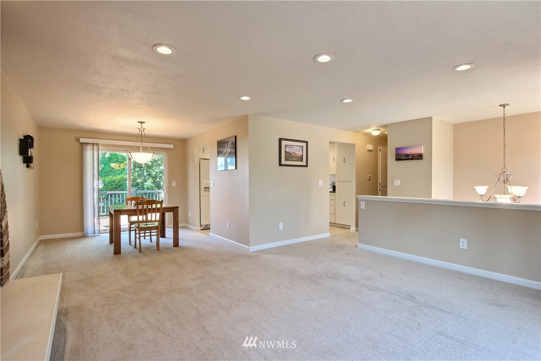 509 223rd Street Southwest Bothell, WA 98021 - Photo 3 of 39 an empty room with windows table and chair