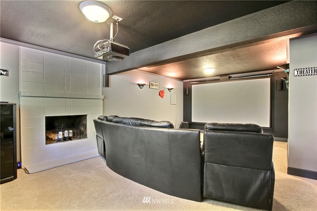 509 223rd Street Southwest Bothell, WA 98021 - Photo 21 of 39 a living room with furniture and a fireplace
