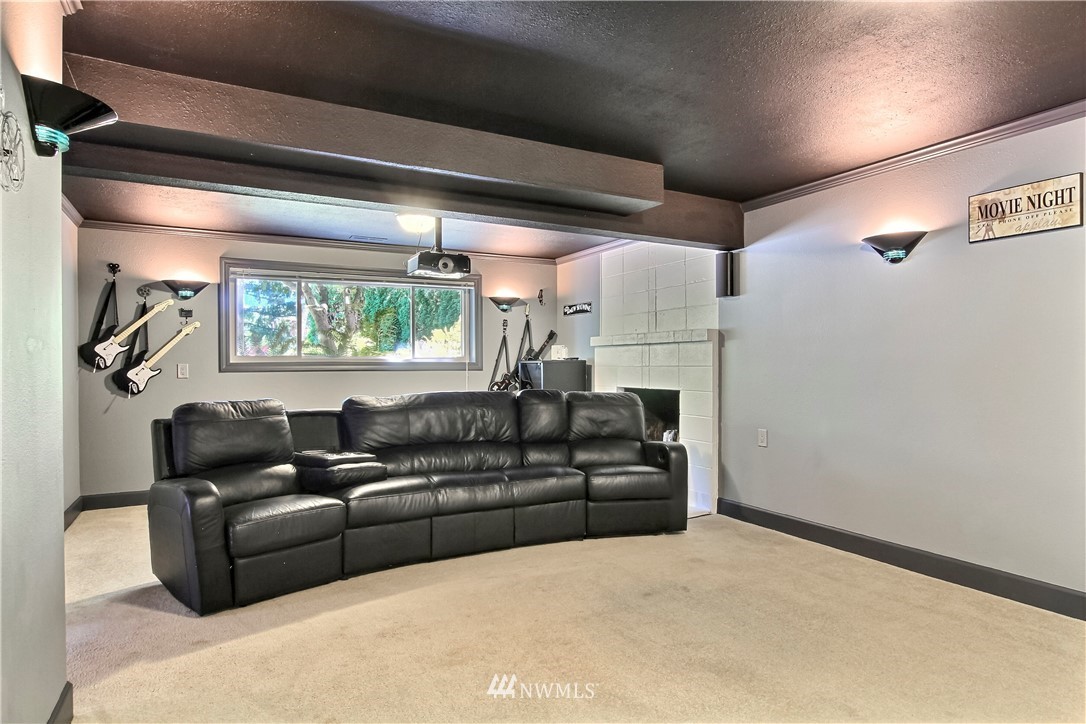 509 223rd Street Southwest Bothell, WA 98021 - Photo 22 of 39 a living room with furniture and a window
