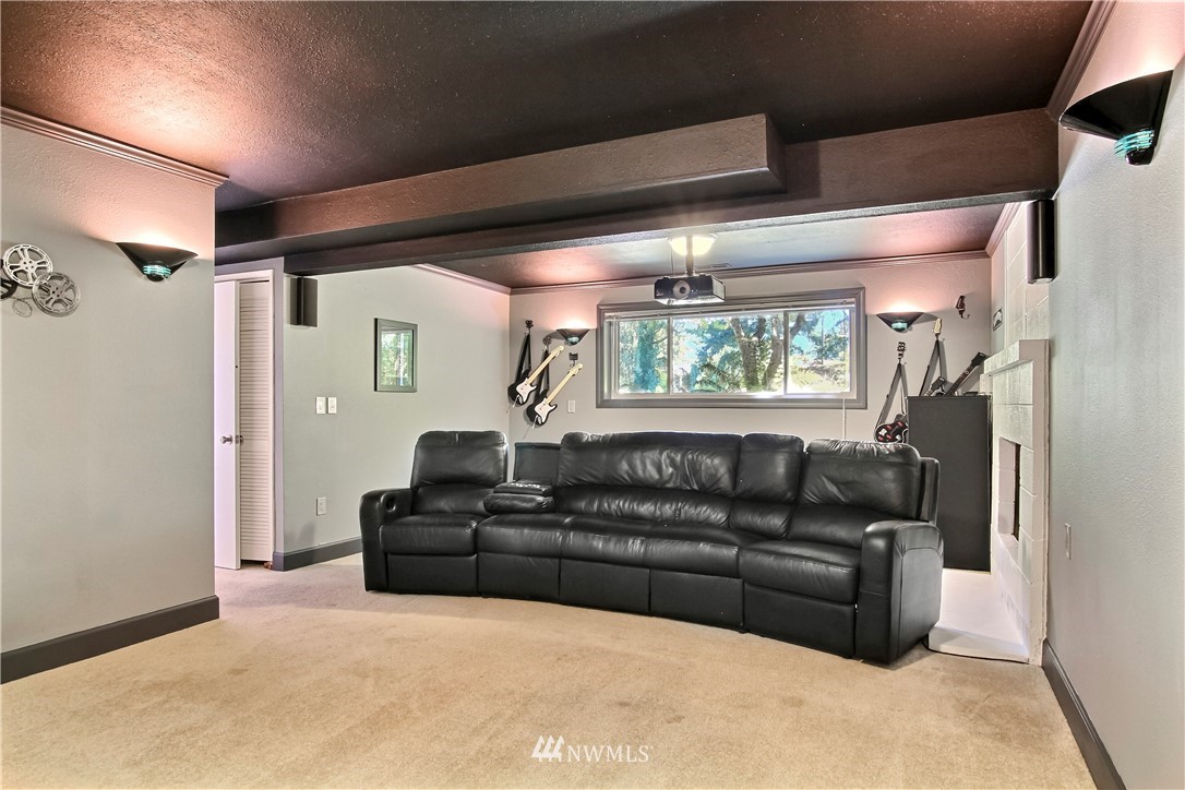 509 223rd Street Southwest Bothell, WA 98021 - Photo 23 of 39 a living room with furniture and a large window