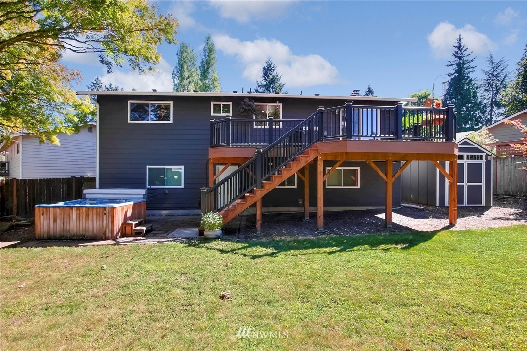 509 223rd Street Southwest Bothell, WA 98021 - Photo 30 of 39 a view of a house with a yard balcony and furniture