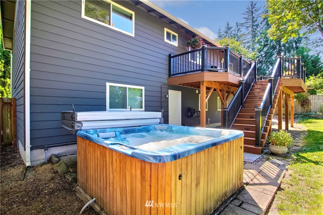 509 223rd Street Southwest Bothell, WA 98021 - Photo 31 of 39 a view of a house with backyard and sitting area