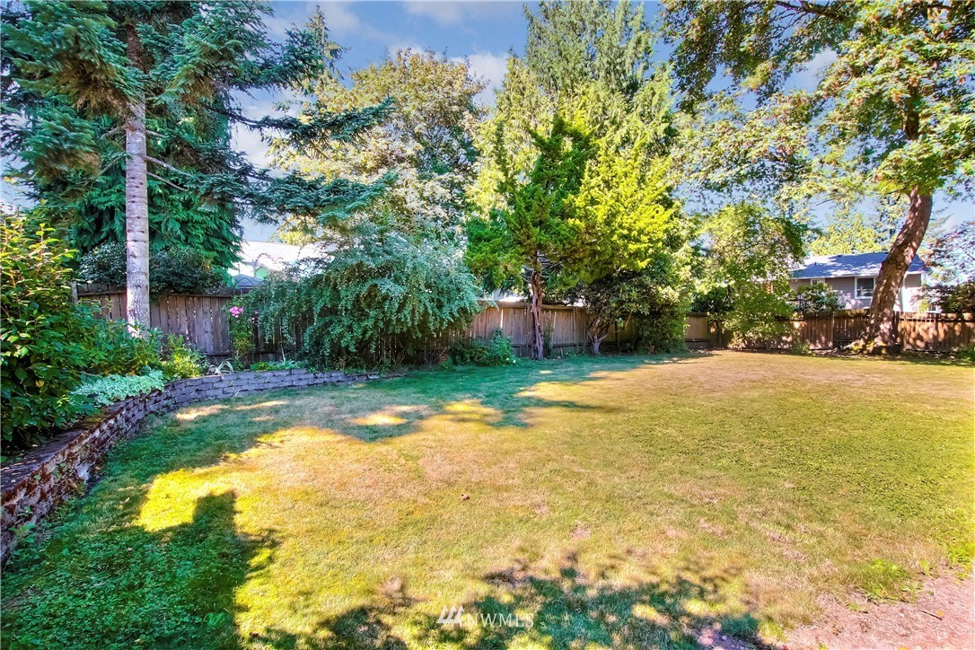 509 223rd Street Southwest Bothell, WA 98021 - Photo 35 of 39 a view of a yard with swimming pool