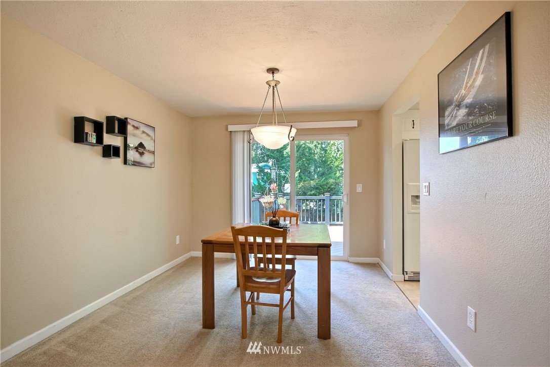 509 223rd Street Southwest Bothell, WA 98021 - Photo 7 of 39 a dining room with furniture and window
