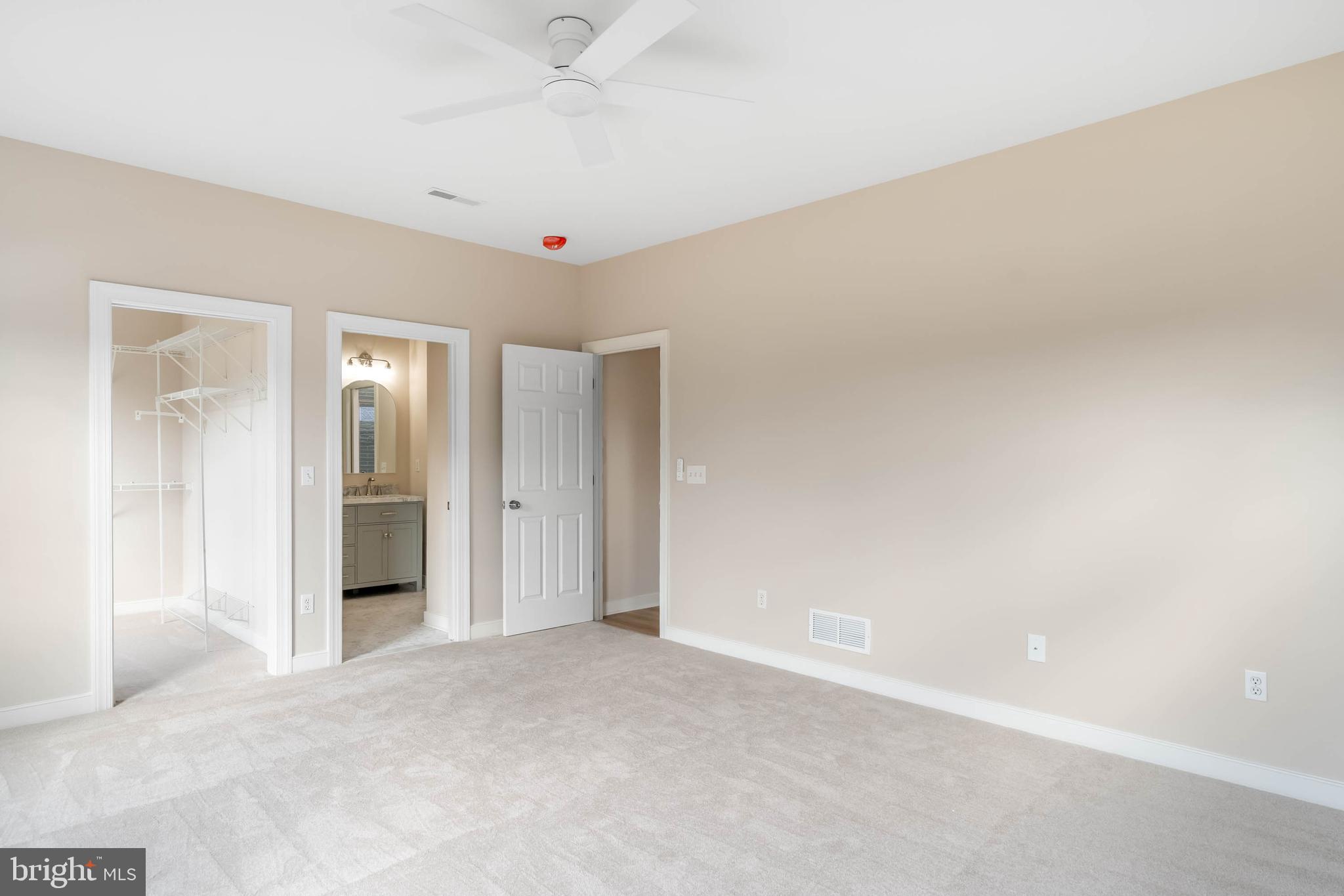 14 Mulberry Street Georgetown, DE 19947 - Photo 15 of 24 Primary bedroom, view to walk-in closet and bath