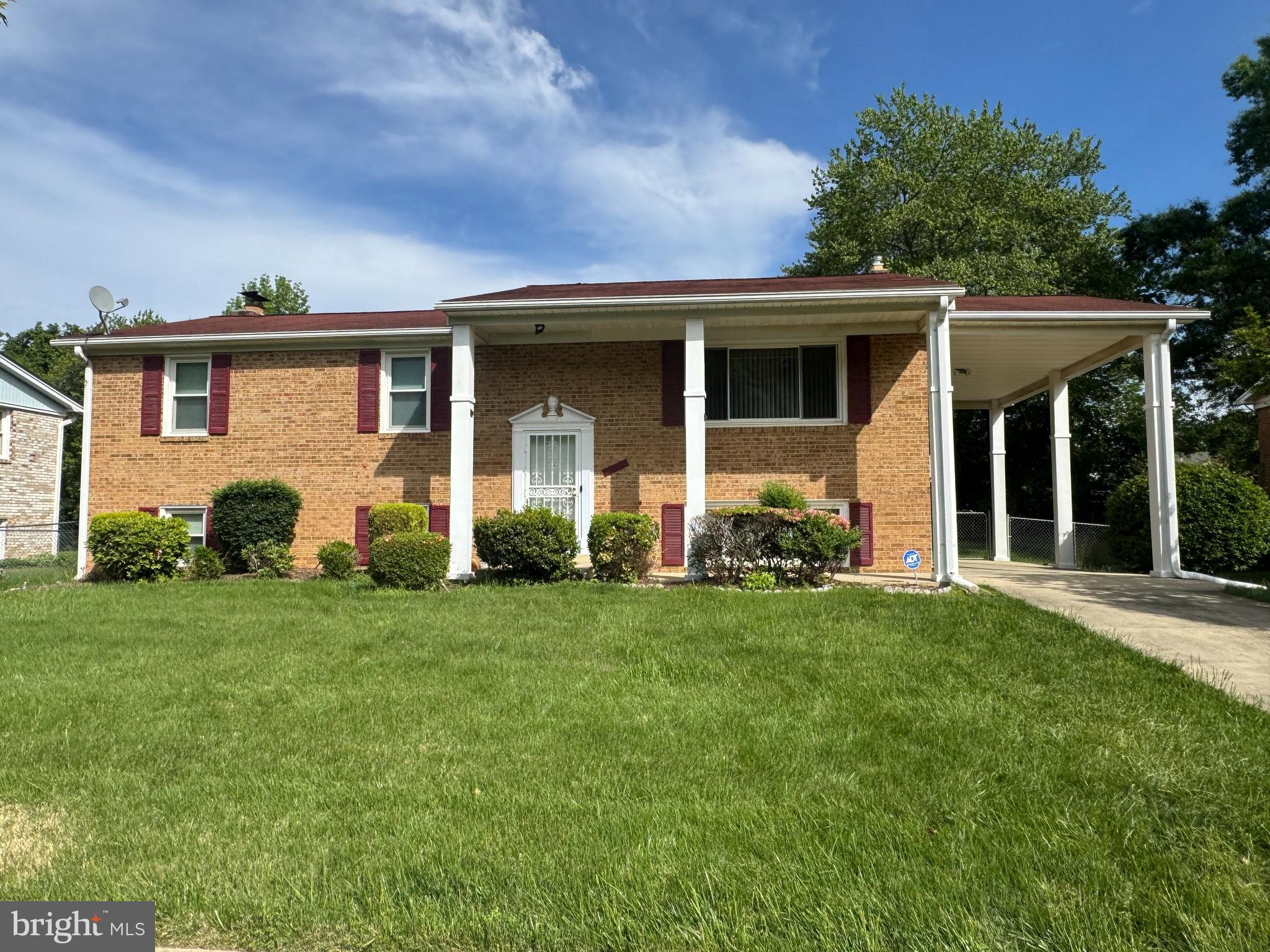 5709 Plata Street Clinton, MD 20735 - Photo 1 of 1 front view of a house with a yard