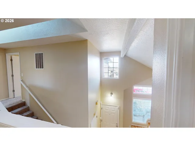 a picture of a living room and bathroom