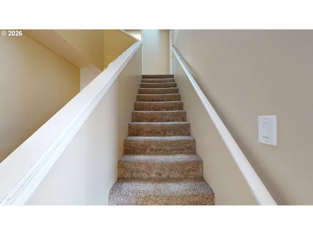 a black and white photo of a living room