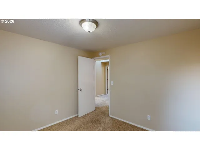 a bathroom with a toilet a sink and shower
