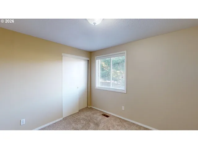 a bathroom with a sink and a shower curtain