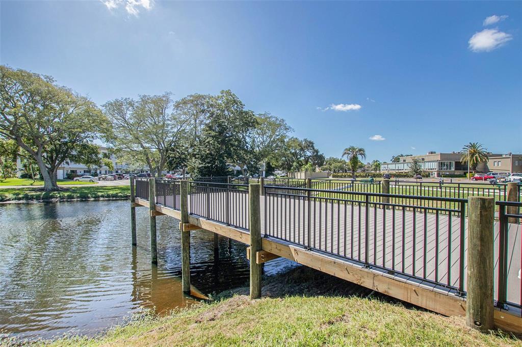 2457 Ecuadorian Way, Unit 75 Clearwater, FL 33763 - Photo 38 of 62 a view of a balcony with lake view