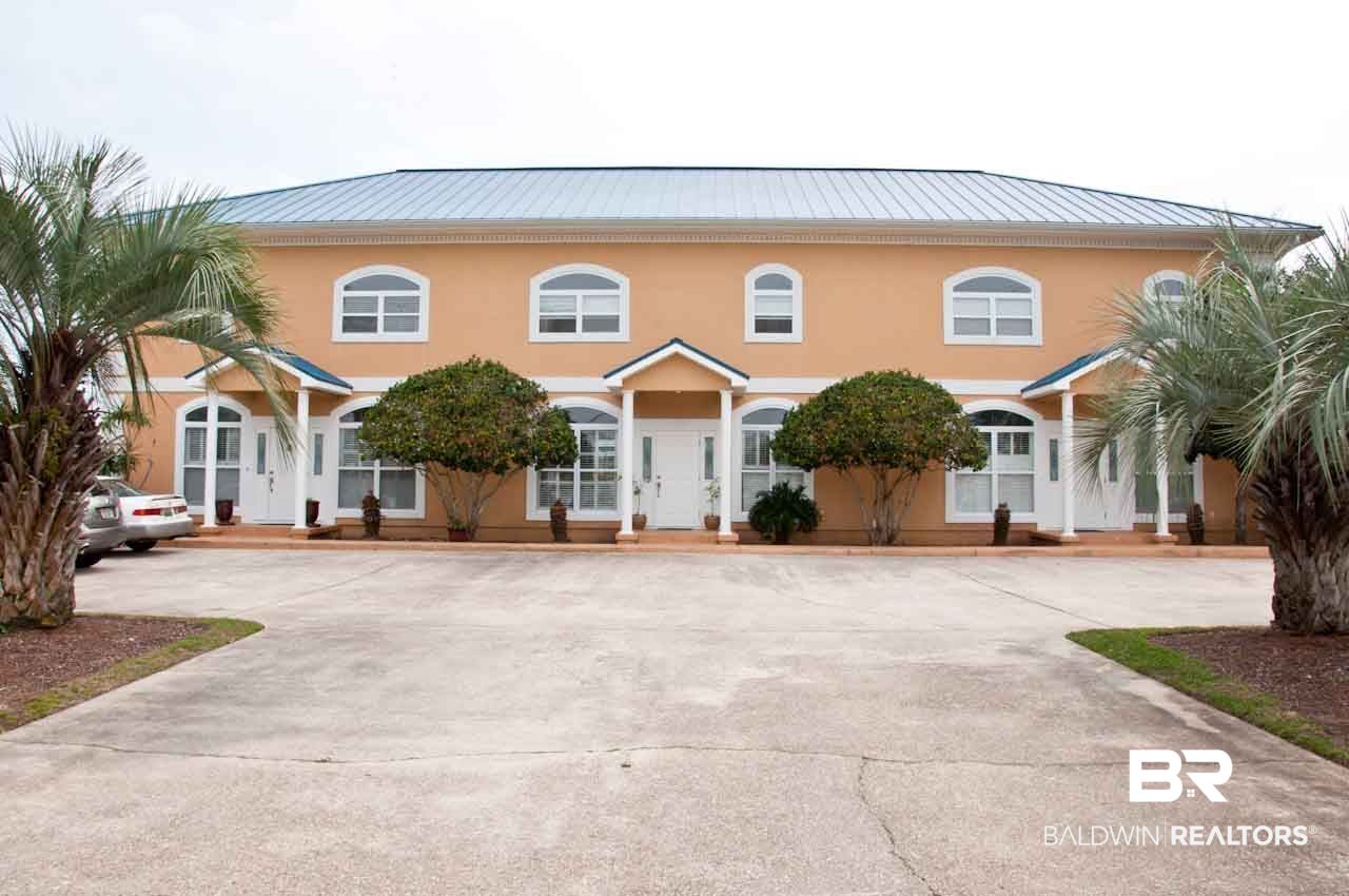 27152 Marina Road, Unit B Orange Beach, AL 36561 - Photo 1 of 37 Waterfront Triplex on Marina Road - "B" in Middle