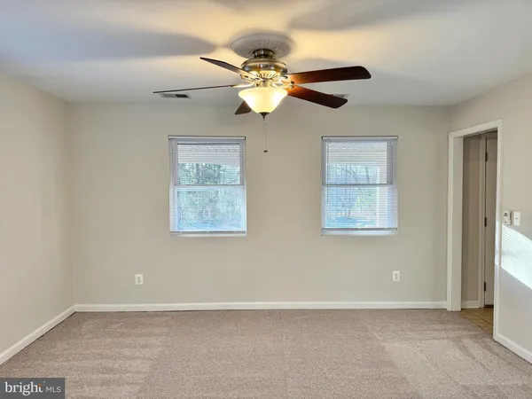a view of an empty room with window