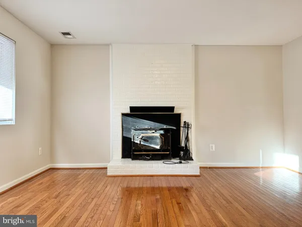 a living room with a fireplace