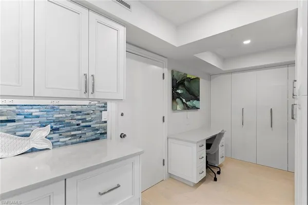 a room with storage and utility