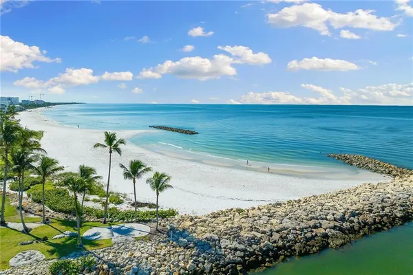 a view of a yard with an ocean