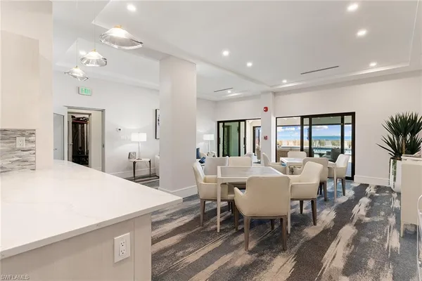 a view of a dining room with furniture