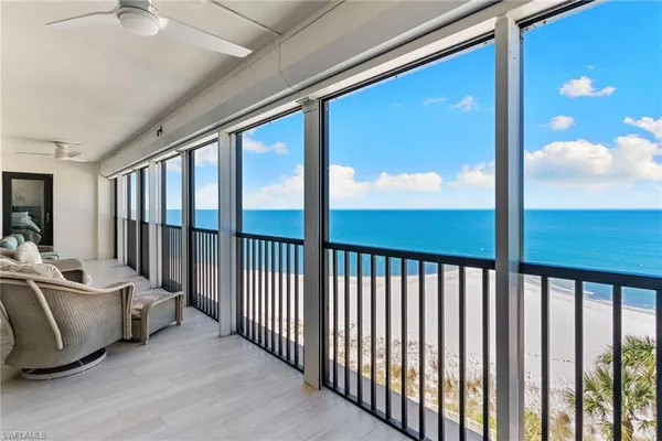 a view of a porch with furniture