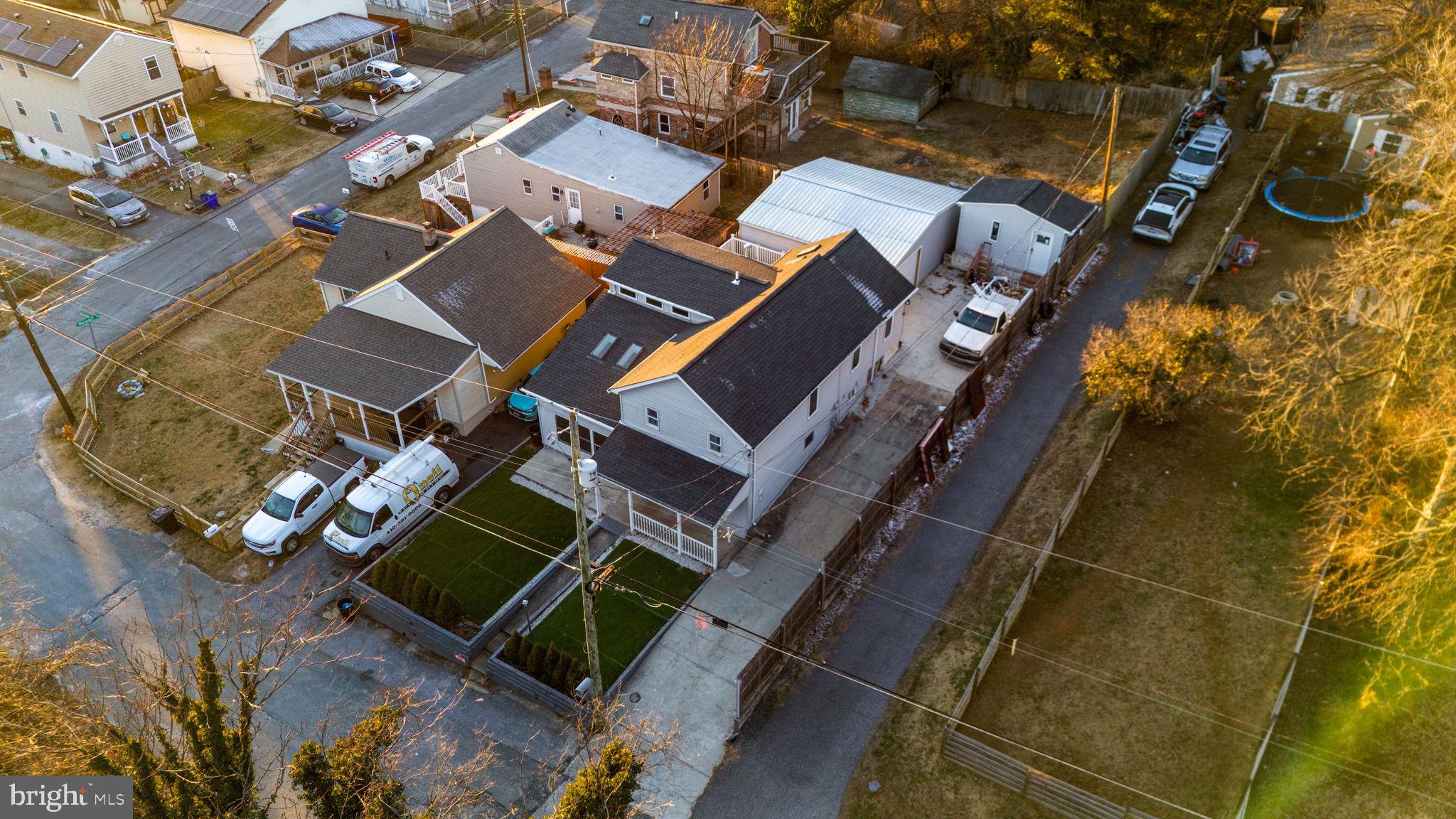 7902 Bridge Avenue Baltimore, MD 21237 - Photo 24 of 28 an aerial view of a house with a yard