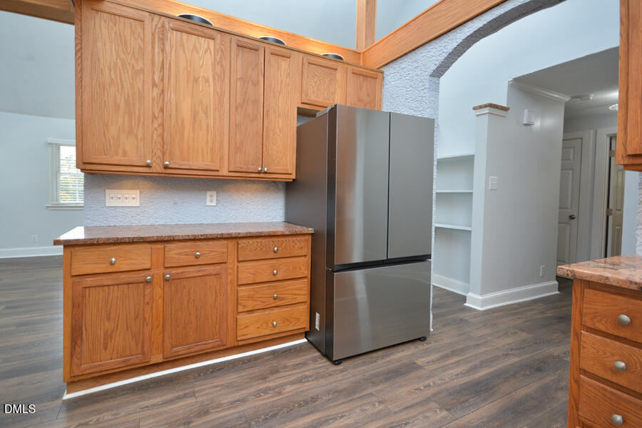 220 Bill Poole Road Rougemont, NC 27572 - Photo 16 of 63 a kitchen with stainless steel appliances granite countertop a refrigerator and a stove top oven