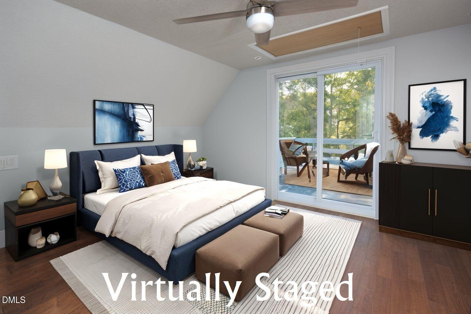 220 Bill Poole Road Rougemont, NC 27572 - Photo 32 of 63 a bedroom with a bed and large windows