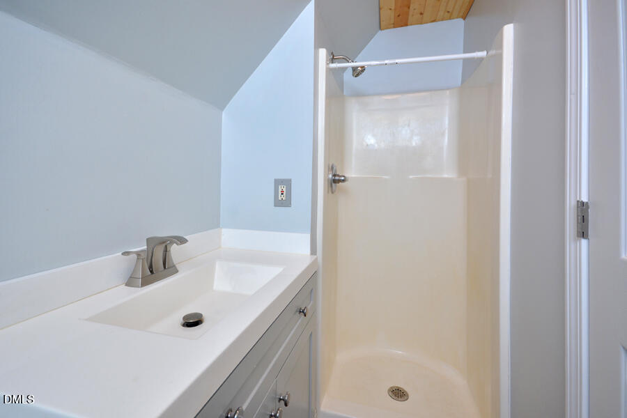 220 Bill Poole Road Rougemont, NC 27572 - Photo 34 of 63 a bathroom with a tub and a sink