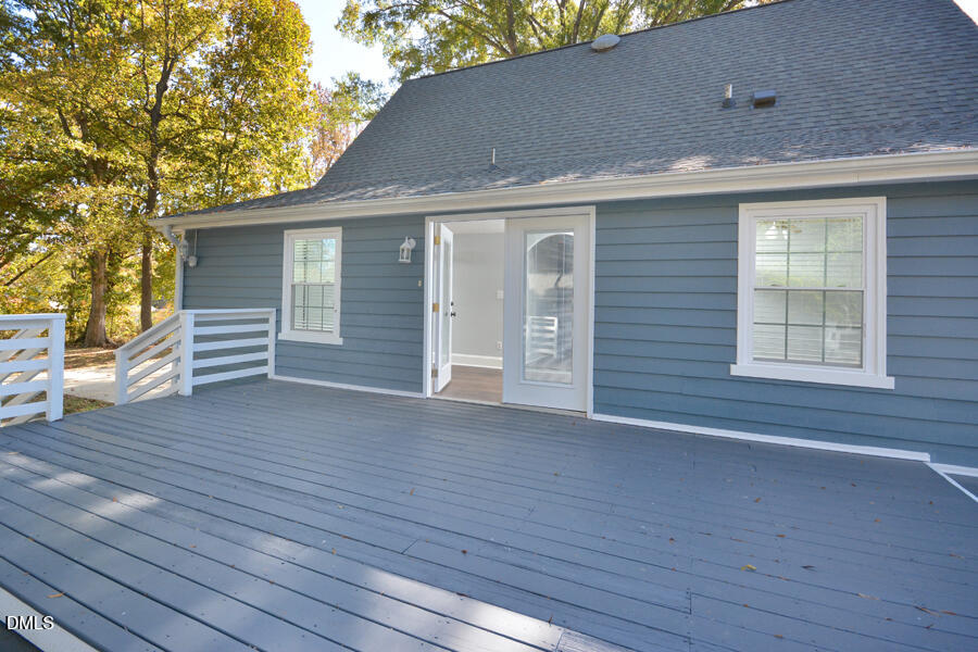 220 Bill Poole Road Rougemont, NC 27572 - Photo 50 of 63 a view of a house with a wooden deck