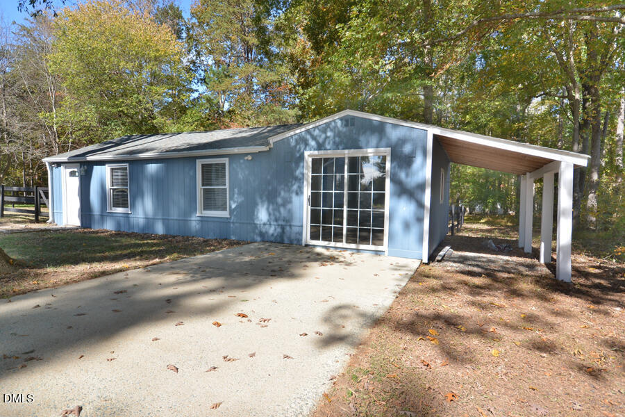 220 Bill Poole Road Rougemont, NC 27572 - Photo 51 of 63 a front view of a house with a yard