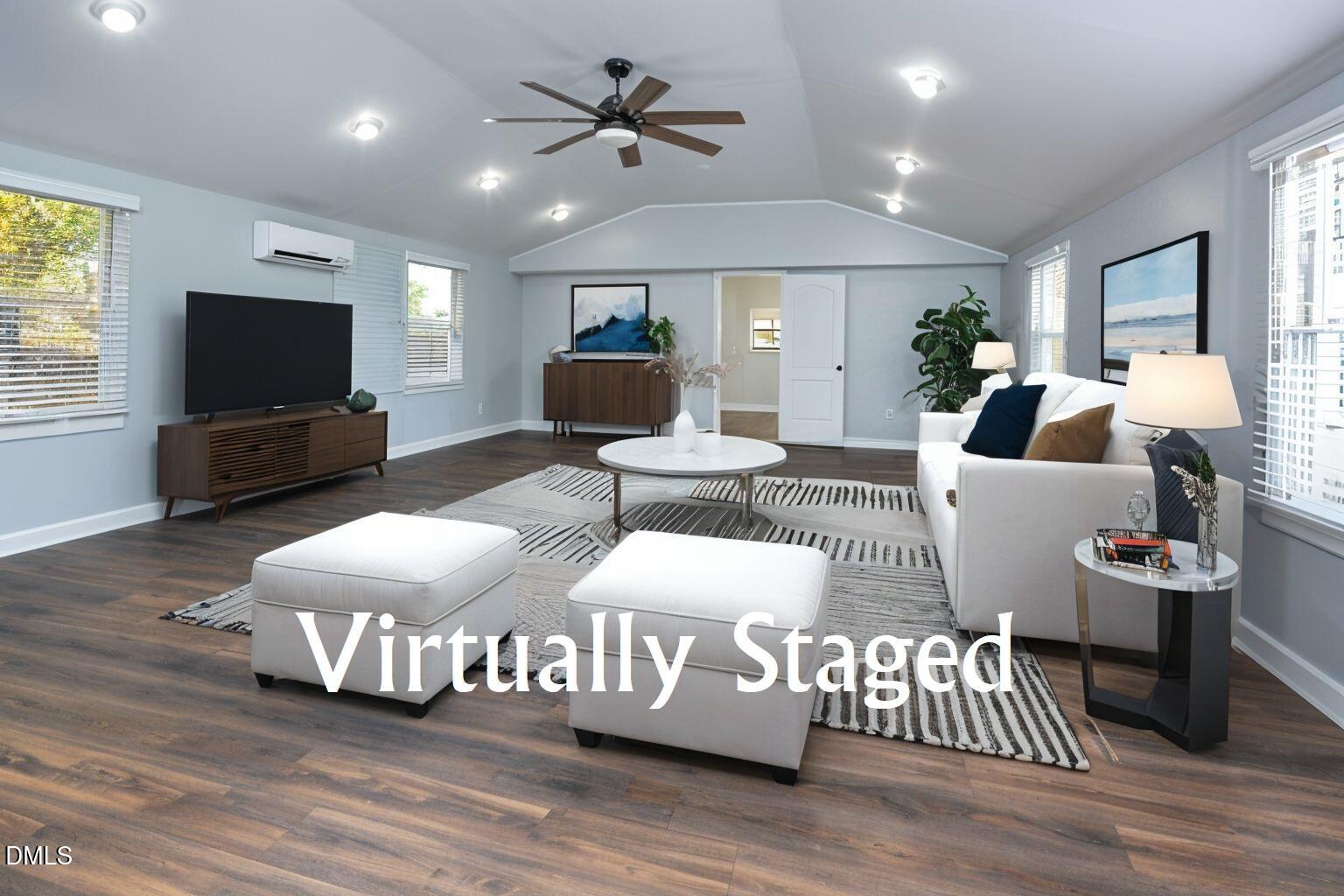 220 Bill Poole Road Rougemont, NC 27572 - Photo 52 of 63 a living room with furniture a ceiling fan and a flat screen tv