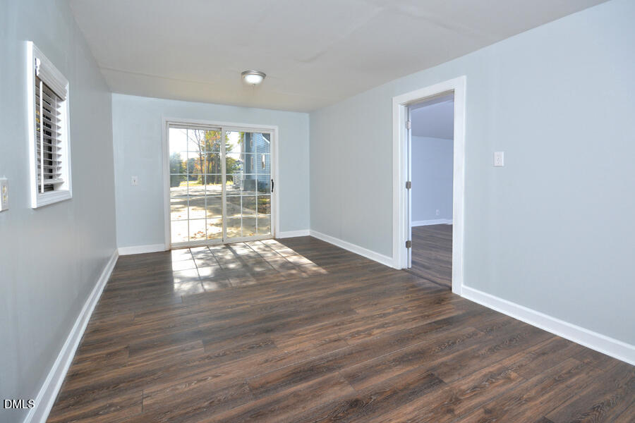 220 Bill Poole Road Rougemont, NC 27572 - Photo 54 of 63 wooden floor in an empty room with a window
