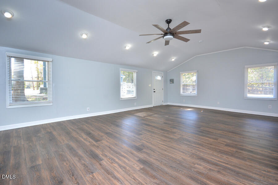 220 Bill Poole Road Rougemont, NC 27572 - Photo 55 of 63 a view of an empty room with wooden floor and a window
