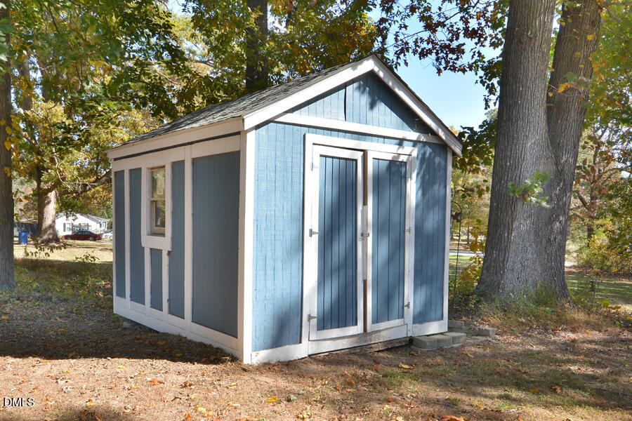 220 Bill Poole Road Rougemont, NC 27572 - Photo 57 of 63 a view of a small house with a tree
