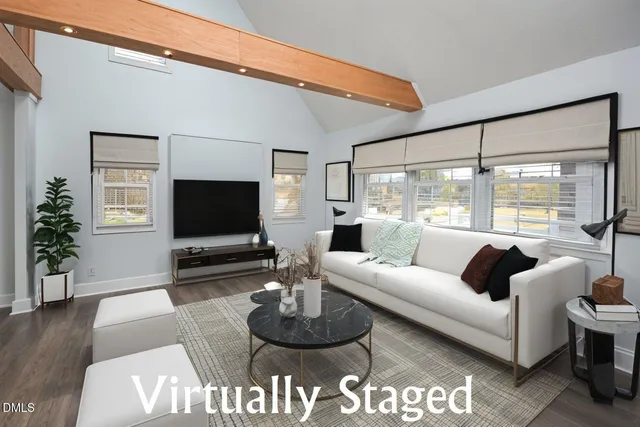 a kitchen with stainless steel appliances granite countertop a refrigerator a stove and a wooden cabinets