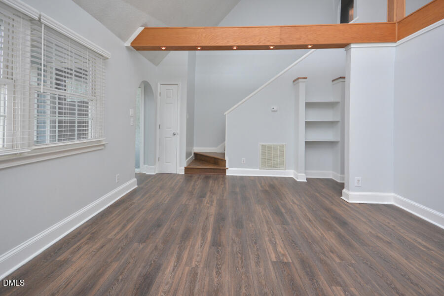 220 Bill Poole Road Rougemont, NC 27572 - Photo 9 of 63 an empty room with wooden floor closet and windows