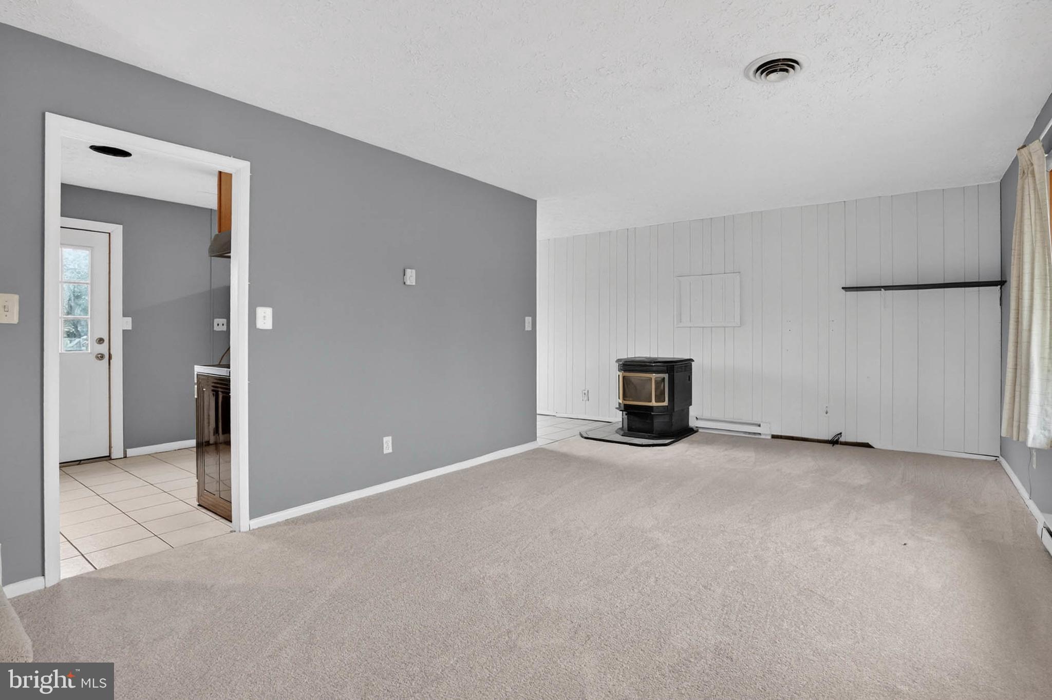 704 Ferguson Road Joppa, MD 21085 - Photo 14 of 30 a view of empty room with a fireplace