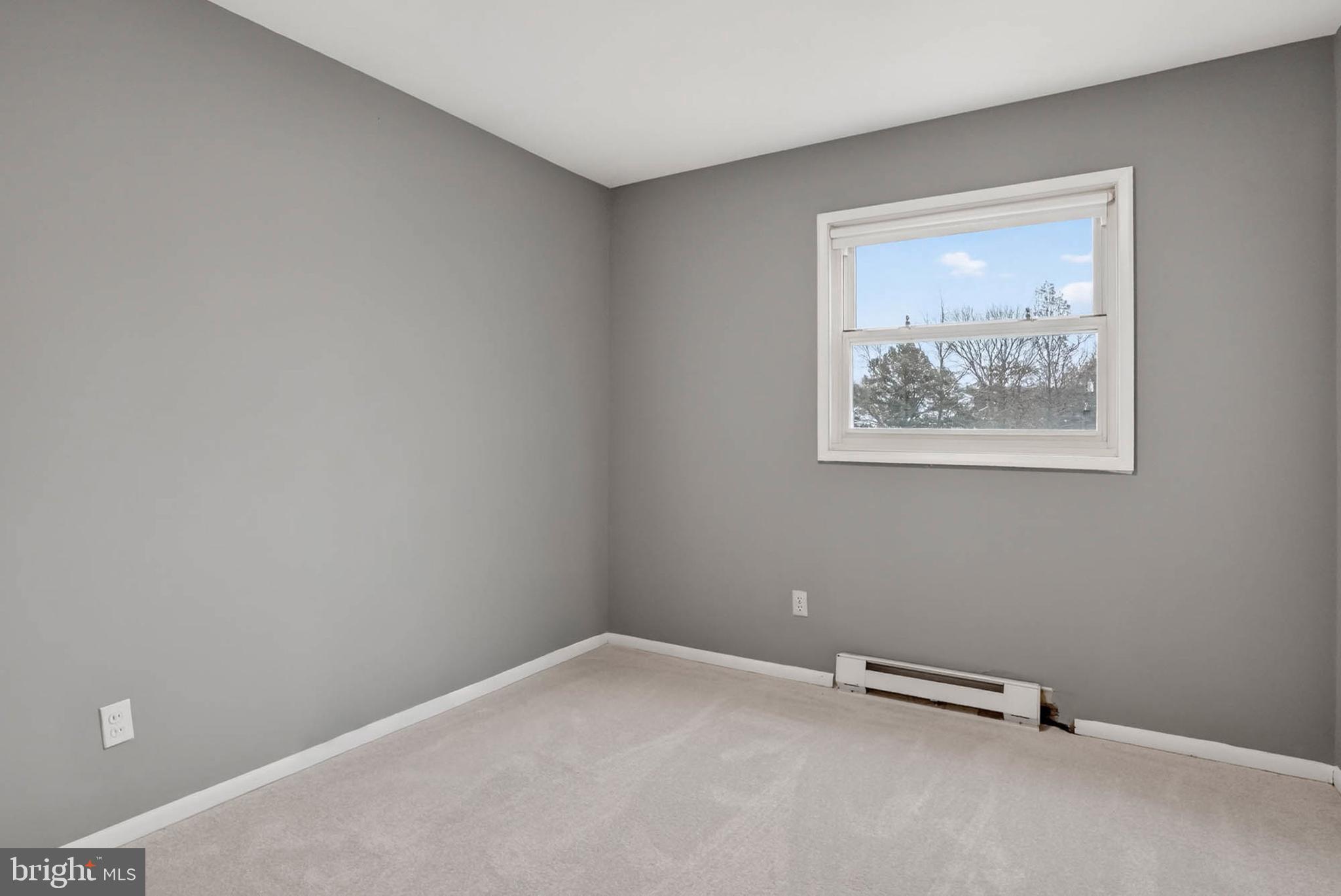 704 Ferguson Road Joppa, MD 21085 - Photo 25 of 30 a view of an empty room with a window