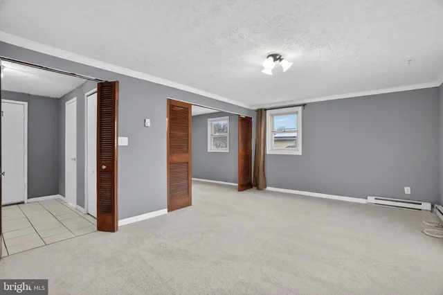 a view of an empty room with window