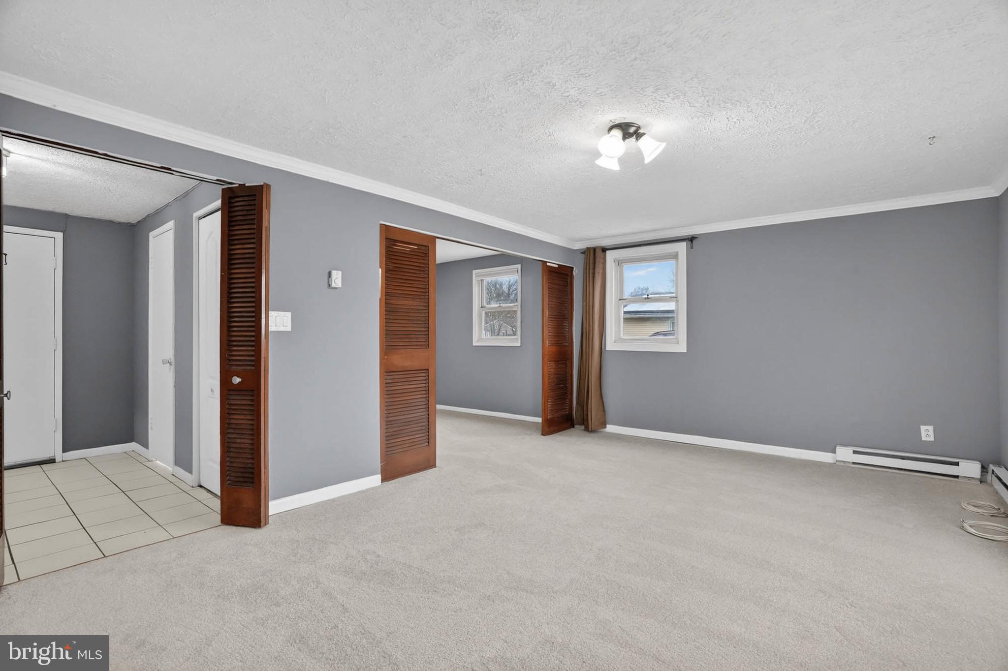 704 Ferguson Road Joppa, MD 21085 - Photo 6 of 30 a view of an empty room with window