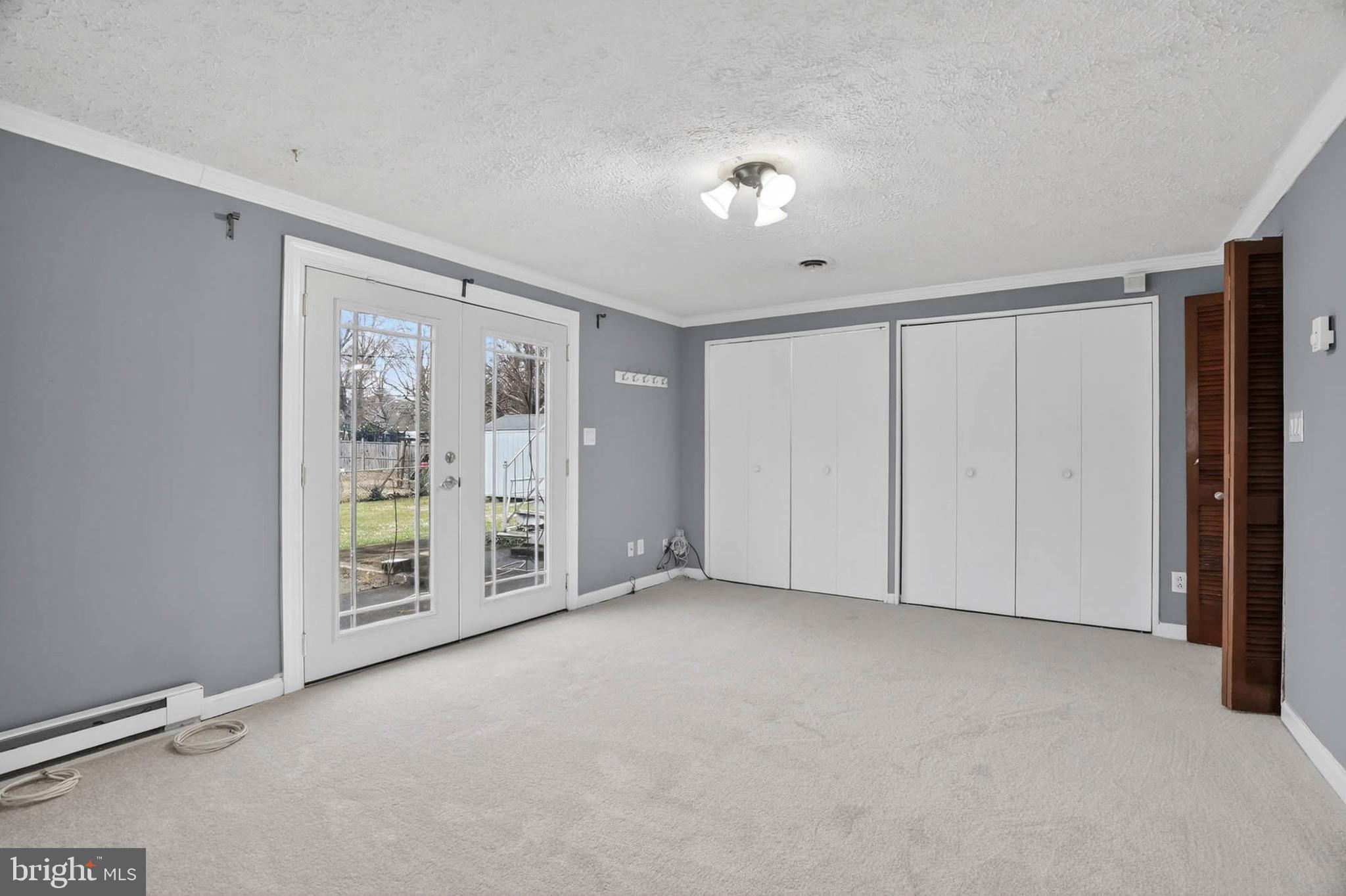 704 Ferguson Road Joppa, MD 21085 - Photo 7 of 30 a view of an empty room with a window