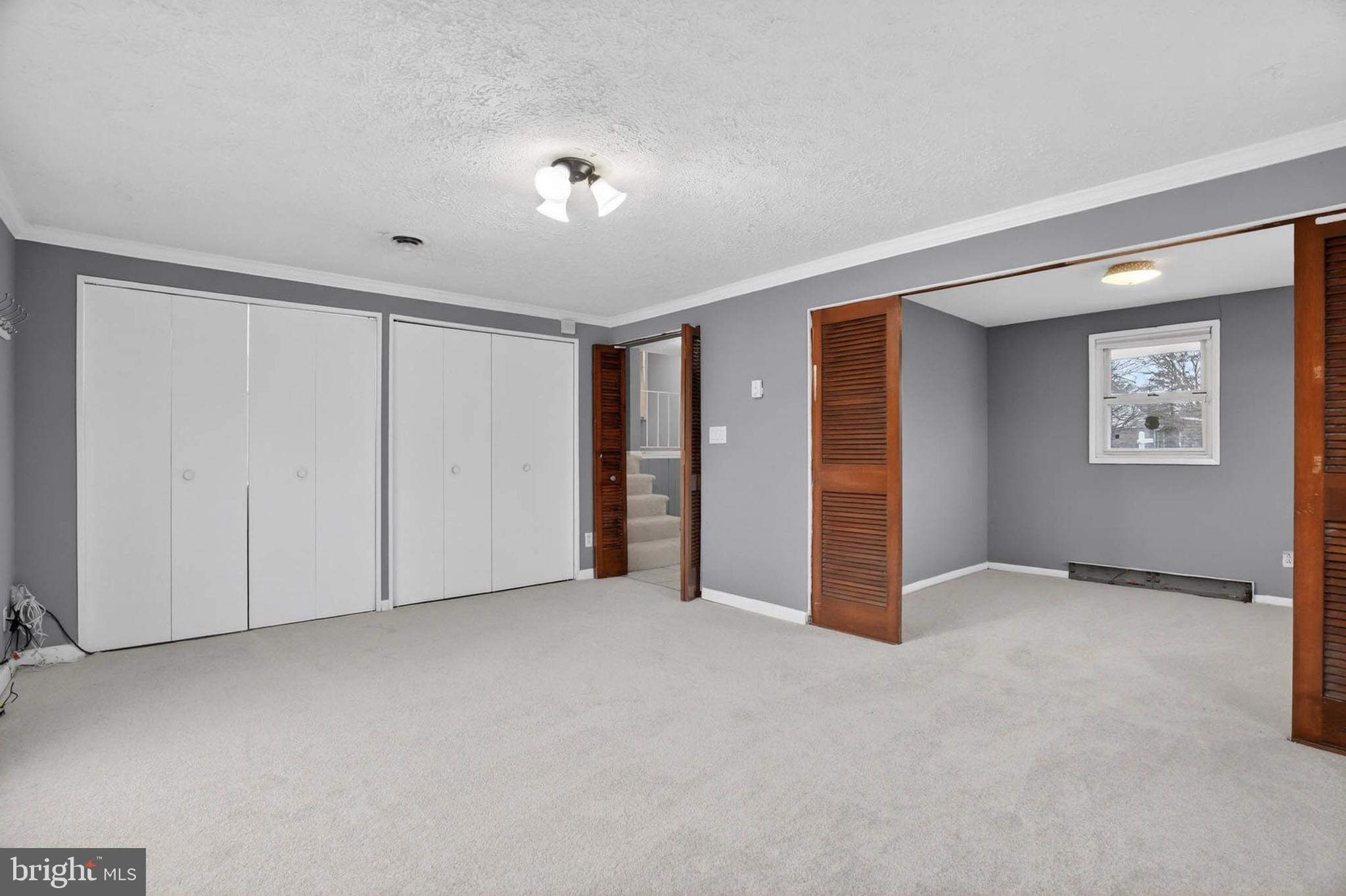 704 Ferguson Road Joppa, MD 21085 - Photo 10 of 30 a view of an empty room with a window