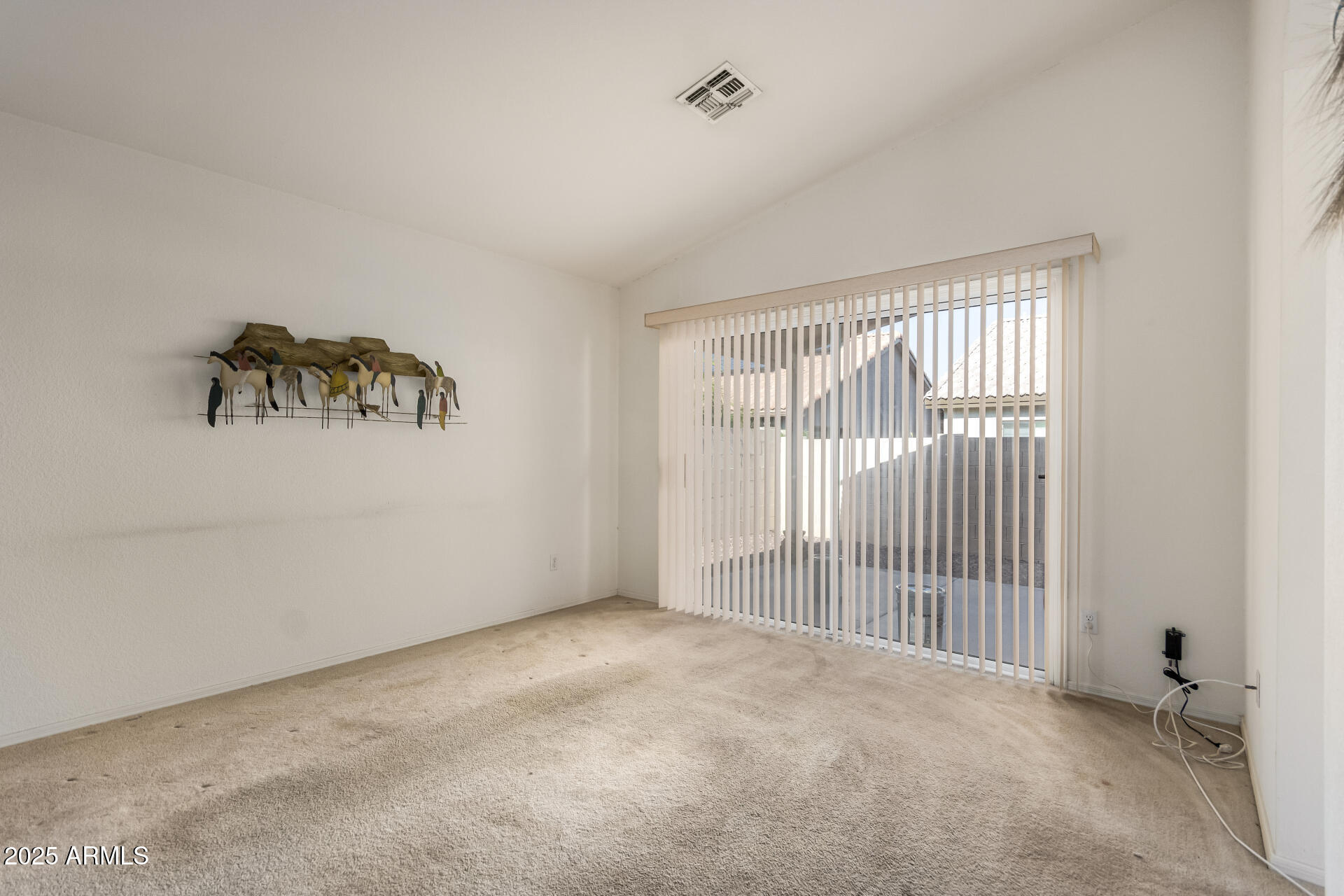 14806 West Verde Lane Goodyear, AZ 85395 - Photo 17 of 30 an empty room with windows