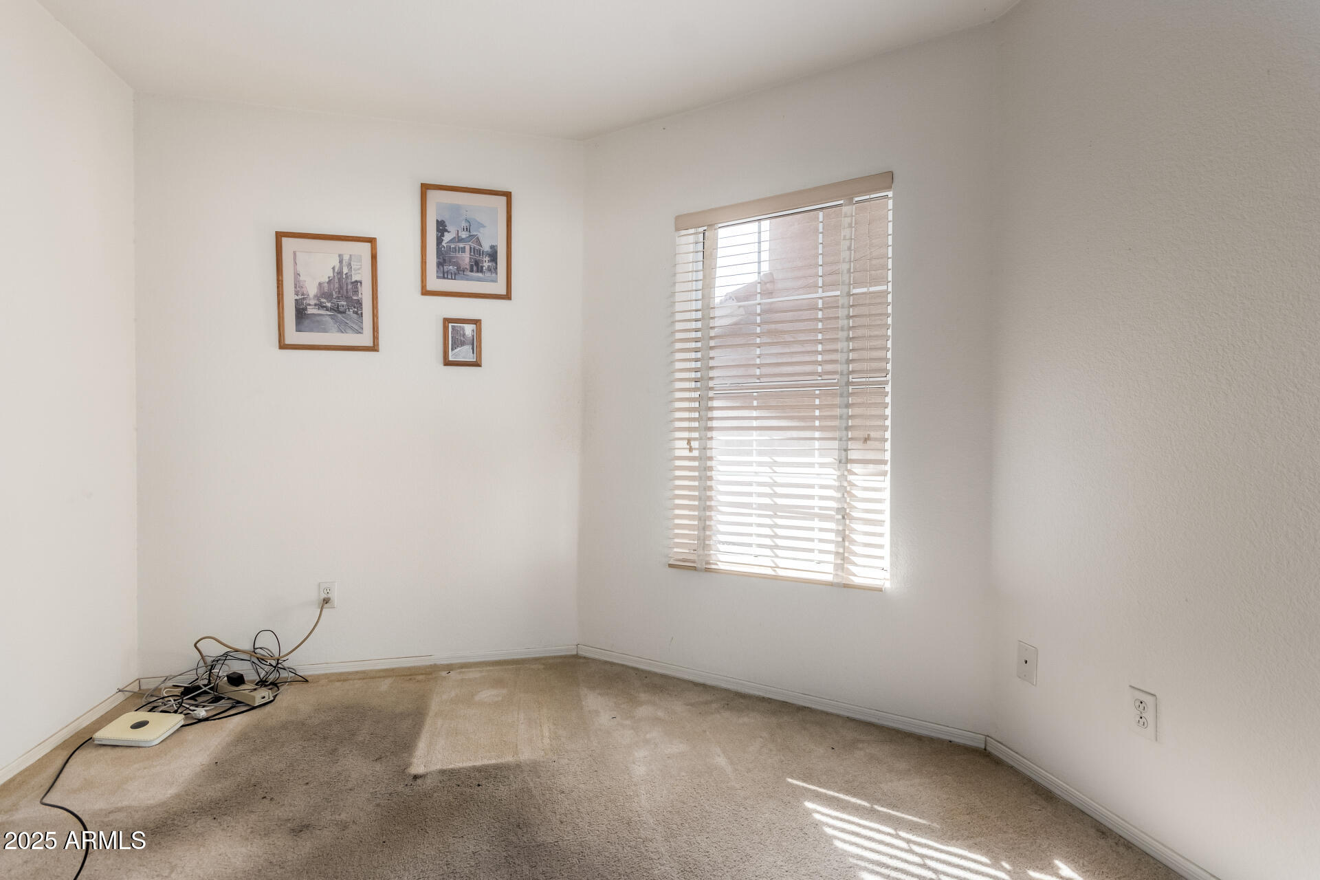 14806 West Verde Lane Goodyear, AZ 85395 - Photo 19 of 30 a view of a room with a window