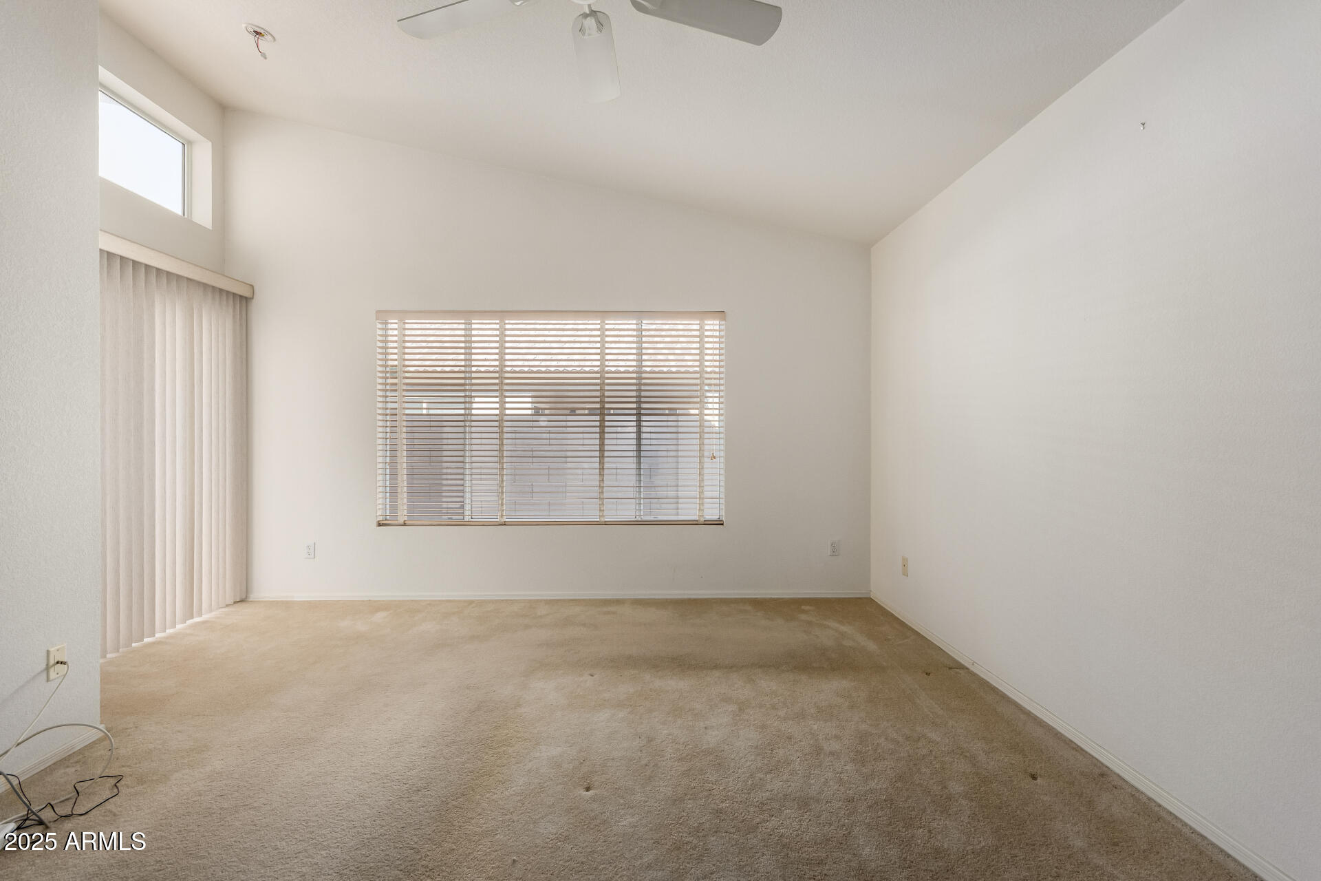 14806 West Verde Lane Goodyear, AZ 85395 - Photo 23 of 30 a view of an empty room with a window