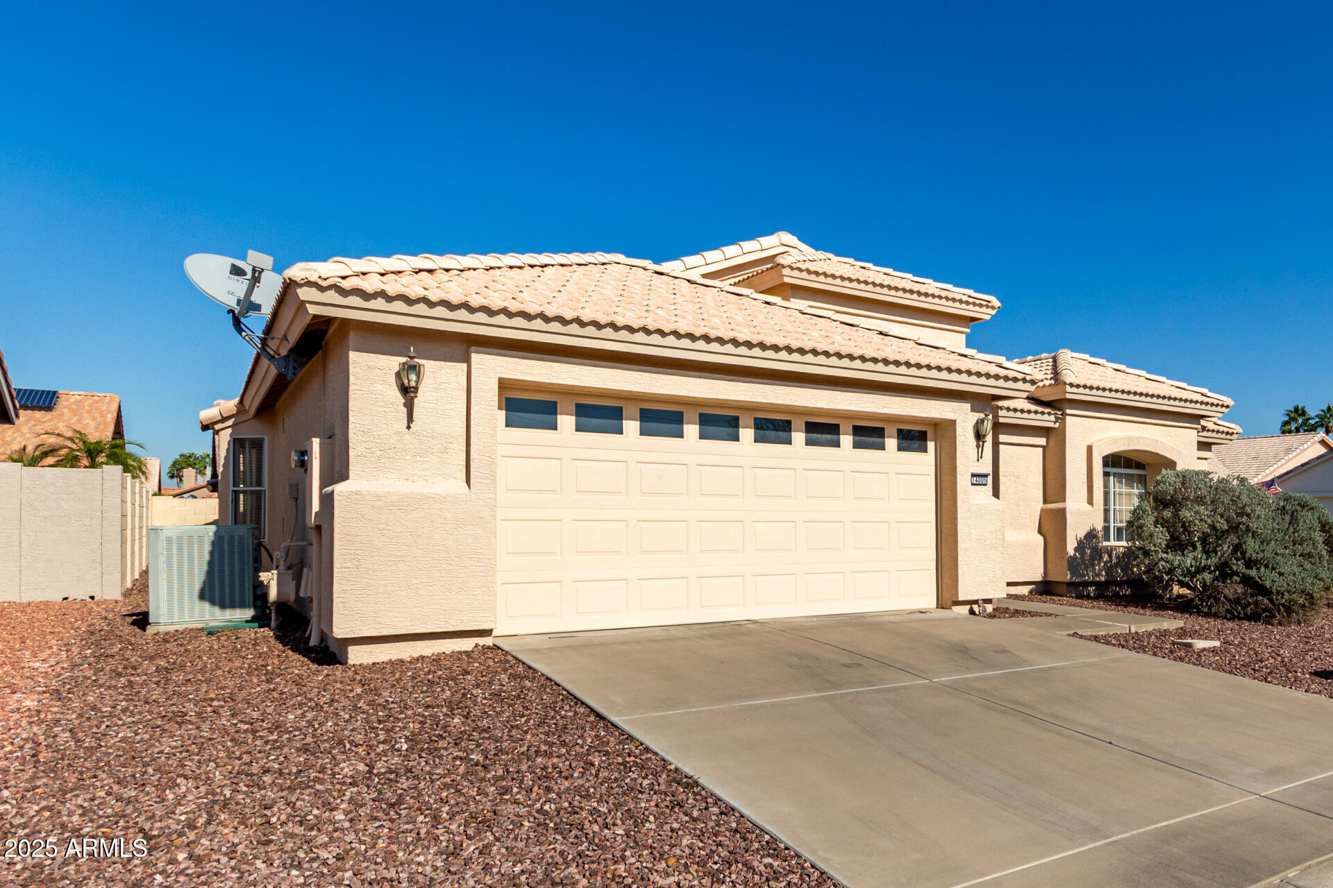 14806 West Verde Lane Goodyear, AZ 85395 - Photo 3 of 30 a front view of a house