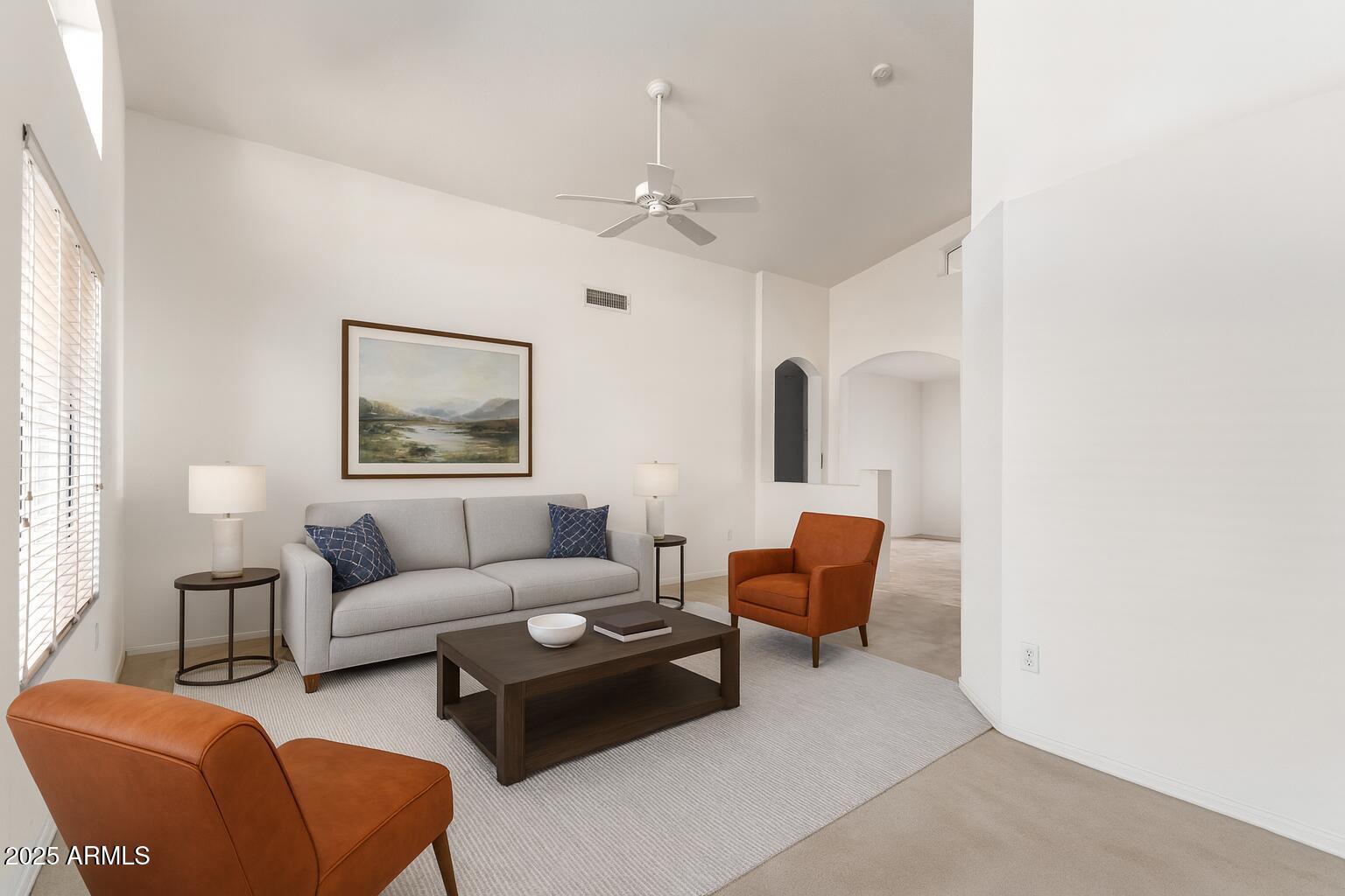 14806 West Verde Lane Goodyear, AZ 85395 - Photo 6 of 30 a living room with furniture and a window